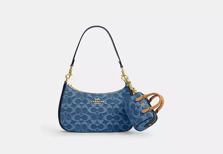 Mini Rowan Bag Charm In Signature Denim